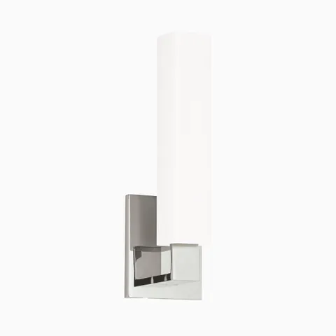 Vertical wall sconce with tall opal glass diffuser and satin nickel backplate, offering a soft, modern take on minimalist lighting.