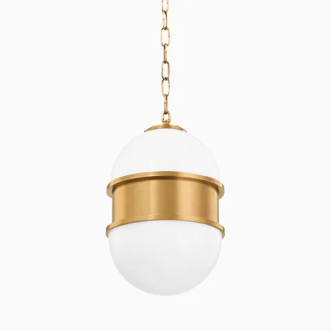 Our Theodore Pendant in Vintage Brass features twin glossy white glass domes wrapped in a bold satin brass band, blending vintage shape with warm modern elegance.