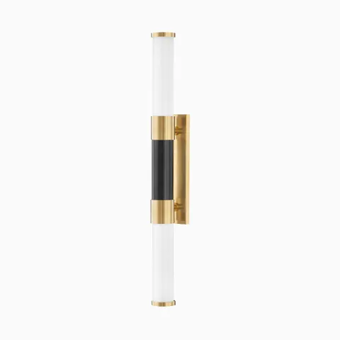 Modern vertical wall sconce with frosted cylindrical diffuser, black center detail, and aged bronze mount for refined ambient lighting.