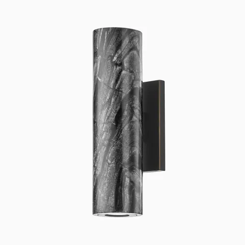 Modern wall sconce with cylindrical marble shade and black metal backplate, offering a sleek architectural accent and focused lighting.