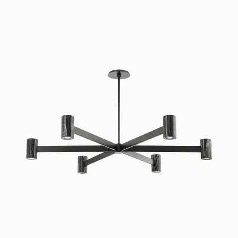 Modern black chandelier with six arms and cylindrical marble shades, creating a bold sculptural fixture with dramatic lighting appeal.
