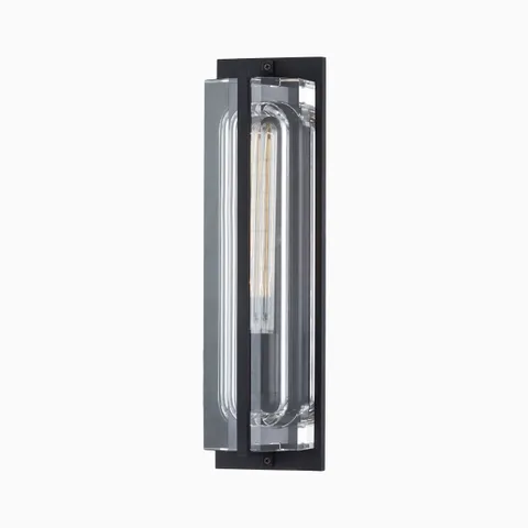 Contemporary wall sconce with curved clear glass tubing and a bold matte black brass frame.