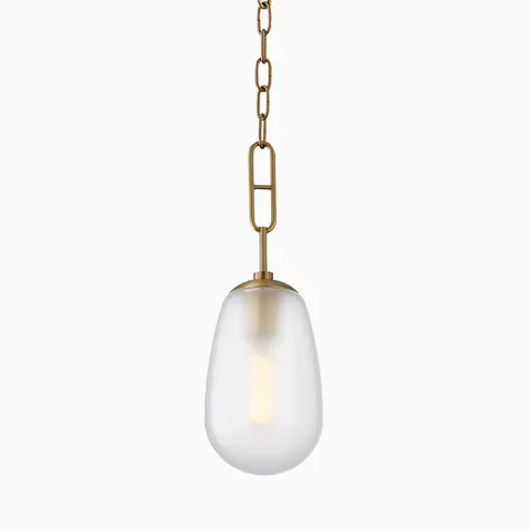 Elegant pendant light with a frosted teardrop glass shade and aged brass chain suspension.