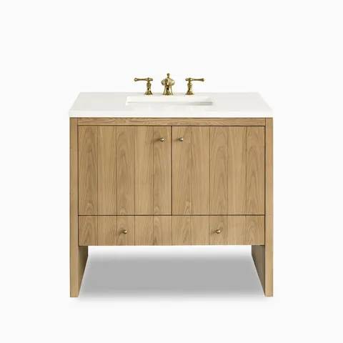 The Gabriella 36" Vanity in Light Natural Oak includes a sleek White Zeus quartz top, fluted front doors, full-width drawer, and soft champagne brass hardware accents.