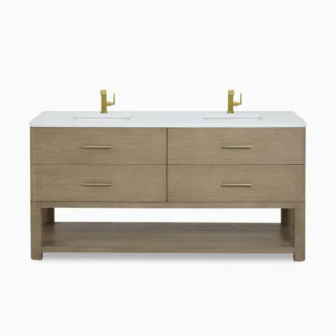 Paxton 72-inch double vanity in pebble oak with white countertop, dual integrated sinks, brushed brass faucets, four drawers, and open shelf.