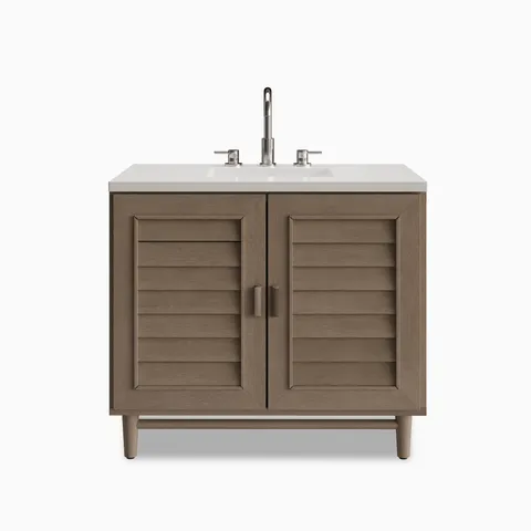 Trisha 36" single vanity in Whitewashed Walnut with a 3 cm White Zeus Quartz countertop, featuring an undermount sink, brushed nickel faucet, two louvered cabinet doors, and tapered legs.
