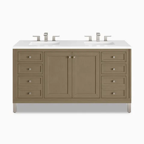 Finished in Walnut Whisper, the Janelle 60 inch double vanity features warm brown wood cabinetry, paneled cabinet doors, four side drawers, and a 3 cm White Zeus Silestone countertop.