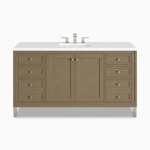 A 60 inch Janelle single vanity in Walnut Whisper with natural brown wood cabinetry, framed cabinet panels, six storage drawers, and a 3 cm White Zeus Silestone top.