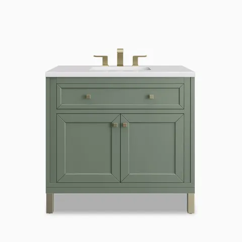Our Janelle 36 inch single vanity in Smokey Celadon pairs muted green wood cabinetry with paneled cabinet doors, a full-width drawer, brass hardware, and a White Zeus Silestone top.
