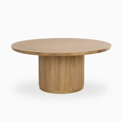 Round 68-inch dining table in rustic oak with a smooth wood top and cylindrical ribbed base, offering natural warmth and modern elegance.