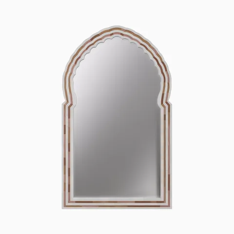 A softly scalloped pishtaq arch gives the Vivara Mirror in Natural/Bone its striking presence, drawing inspiration from the Taj Mahal and the glamour of 1930s Hollywood.