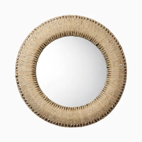 Round mirror with a thick, hand-wrapped corn straw rope frame in warm natural tones, showcasing layered texture and relaxed organic style.