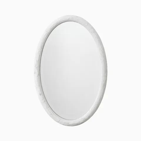 Oval wall mirror with a textured white resin frame, showcasing subtle markings and a refined sculptural finish for modern interiors.