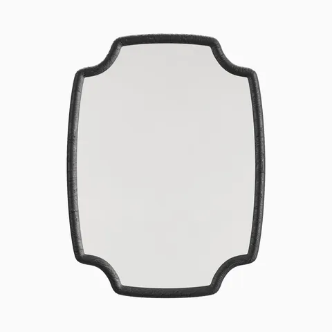 Quatrefoil-style wall mirror with a textured charcoal resin frame, combining classic form with rich detailing and modern appeal.