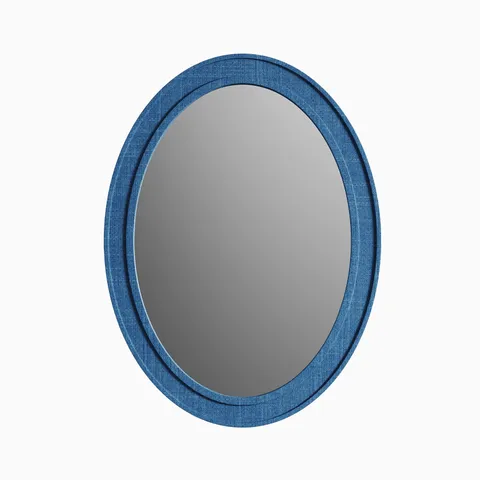 Oval mirror with a classic silhouette, framed in handwoven blue raffia that adds natural texture and depth.