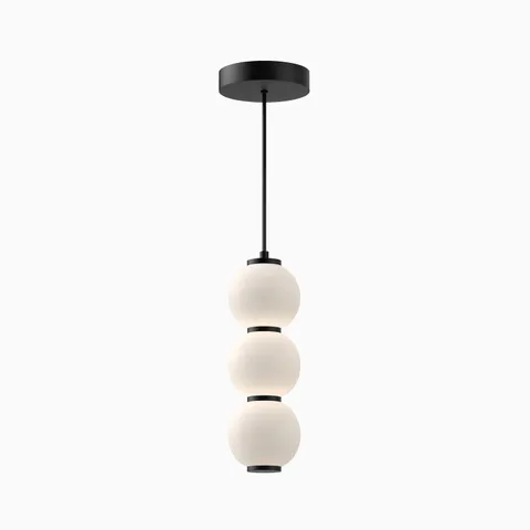 Universal voltage LED modern pendant light with matte black canopy and triple stacked white glass globe shades.