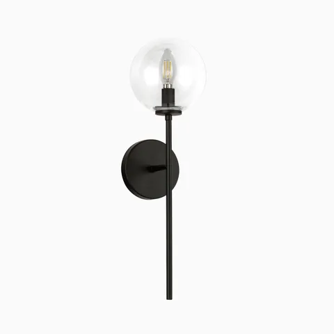 Modern wall sconce with clear glass globe shade and extended matte black vertical metal arm.