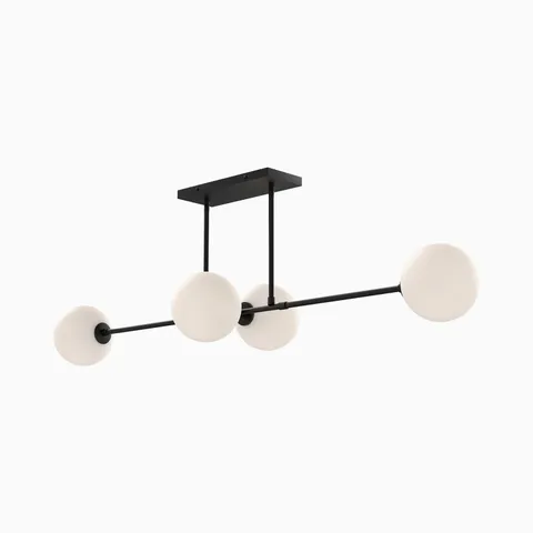 Modern linear pendant light with four frosted glass globe shades on a matte black horizontal metal frame.