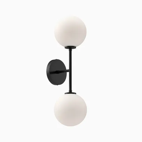 Modern wall sconce with dual frosted glass globe shades and a vertical matte black metal arm.