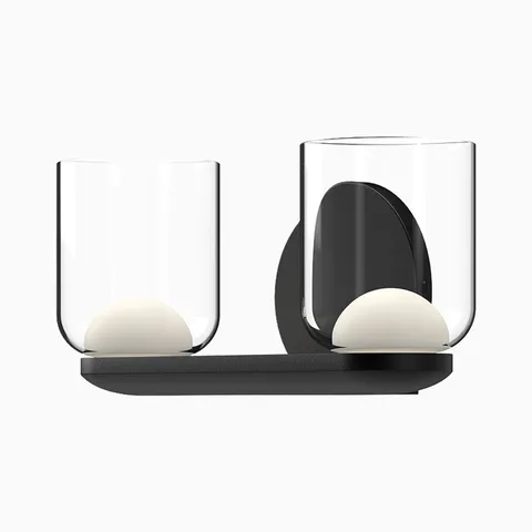 Modern LED wall sconce with dual clear glass cylinder shades and matte black mount.
