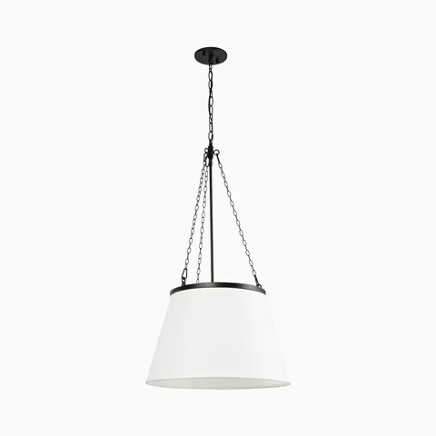 Matte black chain hung pendant with a tapered white fabric shade, creating warm ambient illumination with a clean contemporary look.