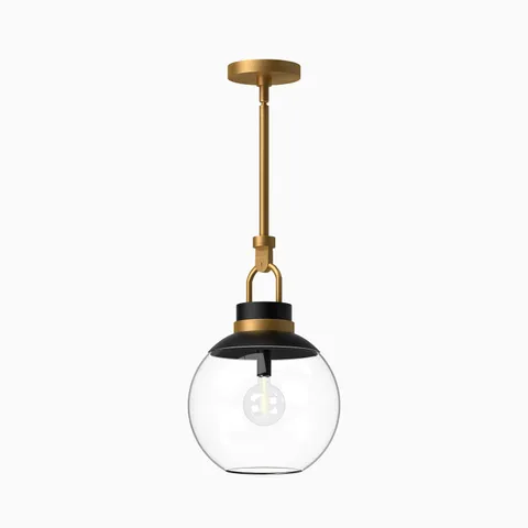 Aged gold pendant light with a clear glass globe shade, black accents, and a matching aged gold canopy.