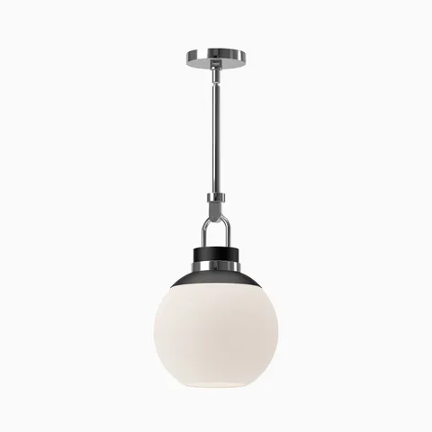 Chrome pendant light with a matte opal glass globe shade and black accents, suspended from a polished chrome canopy.