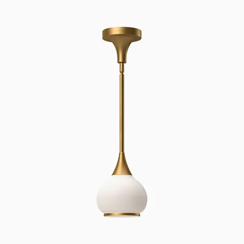 Aged gold pendant light with long slender stem and matte opal glass globe shade.