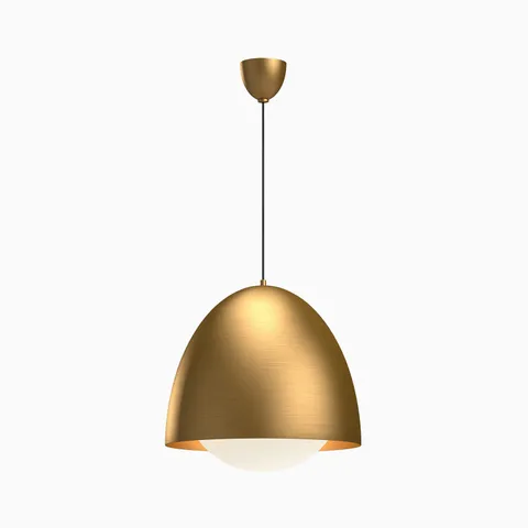 Modern pendant light in brushed gold with a rounded dome shade and white diffuser beneath, offering warm downward illumination suited for kitchen islands or dining spaces.