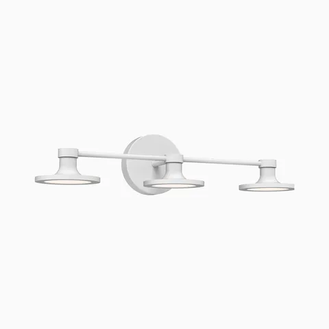 Matte white three-light wall sconce with a horizontal bar and three flat circular shades, mounted on a round backplate.