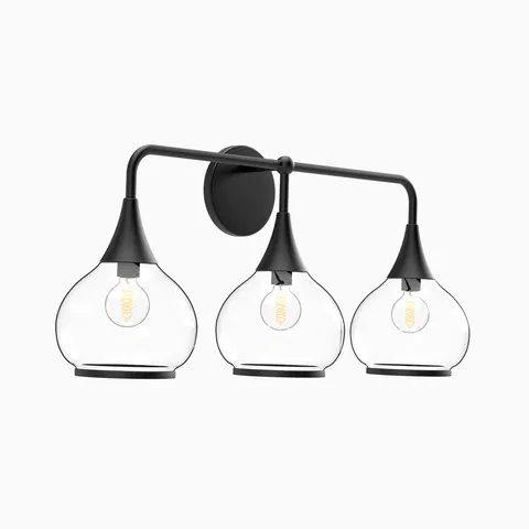 Matte black three-light wall sconce with clear glass globe shades.