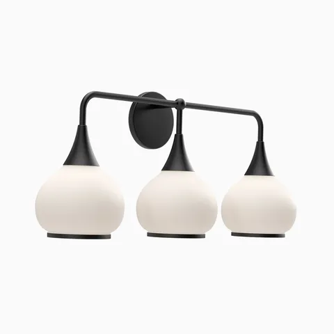 Matte black three-light wall sconce with opal glass globe shades.