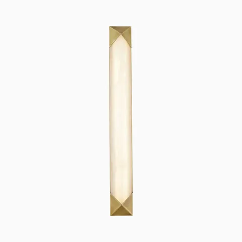 Slim vertical LED wall sconce with warm alabaster-style diffuser and geometric brushed brass end caps.