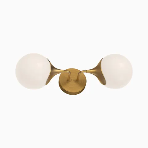 Brushed gold two light vanity wall fixture with curved arms and frosted glass globe shades, creating balanced illumination and a sculptural look for modern bathroom mirrors.