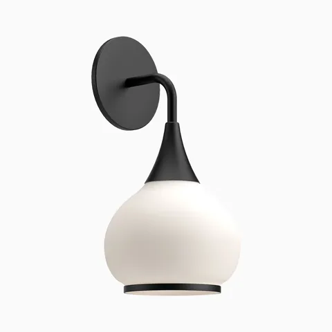Matte black wall sconce with curved arm and round backplate, paired with a rounded opal glass shade and black trim.